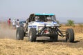 Forty Five degree close-up view of Speeding white Chenowth rally Royalty Free Stock Photo